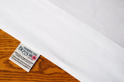Organic cotton pillowcases in white color showing pillowcase tag